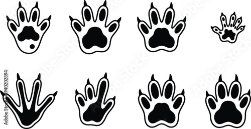 Collection of black animal paw print icons, showcasing various sizes and styles for creative projects