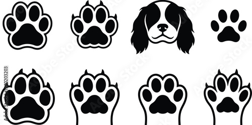Vector illustration of dog paw prints and a Cavalier King Charles Spaniel head, suitable for pet-themed designs