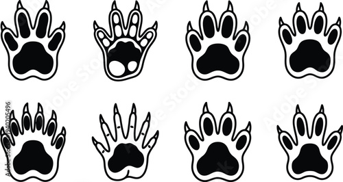Stylized black and white animal paw prints arranged in a grid pattern for creative design applications
