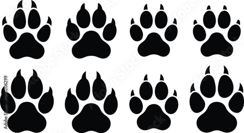 Vector illustration of black animal paw prints arranged in a grid pattern for creative designs