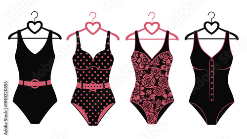Row of four black one piece swimsuits with pink accents and various patterns hangs on heart shaped hangers in a store.