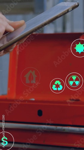Vertical video: Tablet entering, hand swiping, eco icons gathering near red chest for monitoring