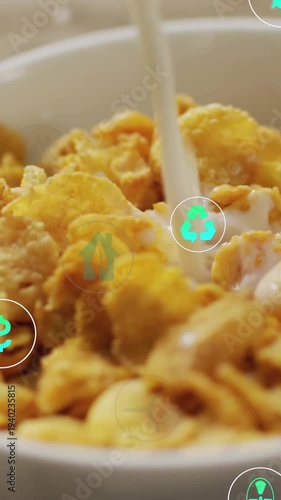 Vertical video: Teal icons appearing, milk stream pouring onto cornflake bowl, showing eco benefits