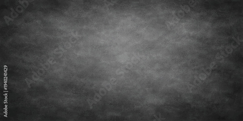 A dark vintage grunge background featuring a textured black and white stone wall with a weathered grey paper pattern for a blank dirty chalkboard design