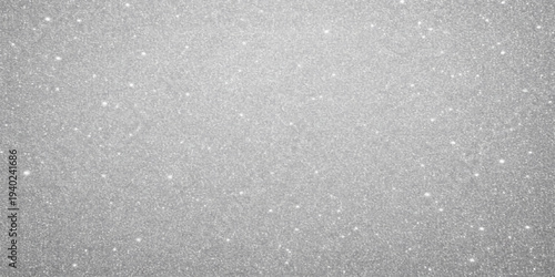 A macro textured background featuring winter snow on a window and gray water drops on a rough black stone surface with a grunge ice pattern