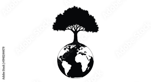 A tree growing on top of the earth a striking silhouette