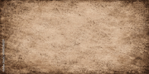 Antique aged parchment background with a grungy stained texture and blank worn surface for vintage design