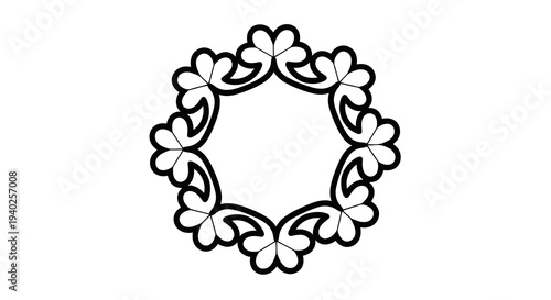 A simple black and white floral wreath on a plain background.