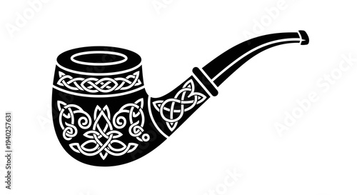 An intricately designed black and white tobacco pipe on a plain white background.