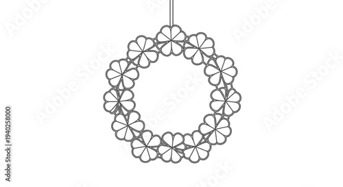 A black metal chandelier with intricate floral pattern hanging from the ceiling.