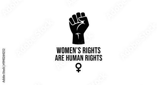Raised fist symbolizing women_s rights as fundamental human rights.