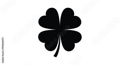 A striking black four leaf clover design presented as a silhouette