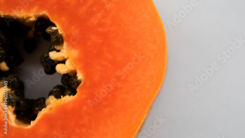 Bild auf Leinwand The main benefits of papaya fruit are that it is rich in fiber and the enzyme papain which helps break down protein, prevents constipation, bloating, and relieves heartburn