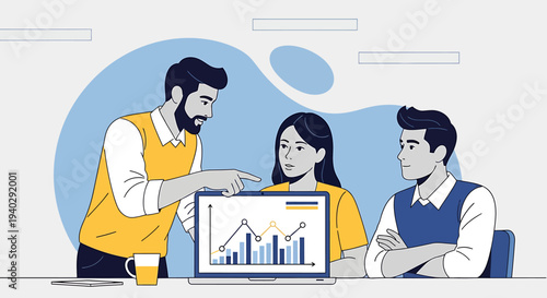 Team discussing business graph on laptop during meeting in a modern office setting from a slightly elevated viewpoint