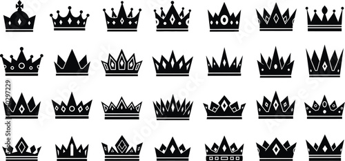 Collection of 32 unique crown silhouettes in black on white background