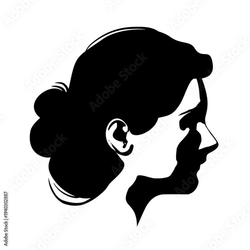 Young woman face side view in low key style. Elegant silhouette of a female head.