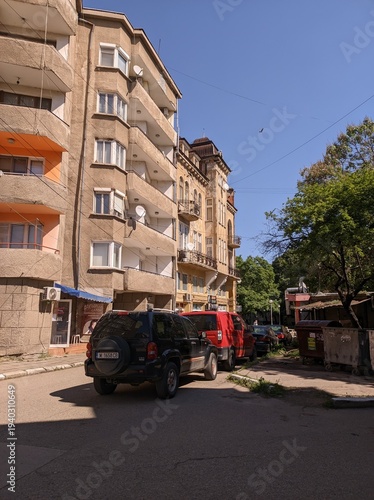 Fotografi Residential buildings from the socialist era in Lom Bulgaria, sunny summer day