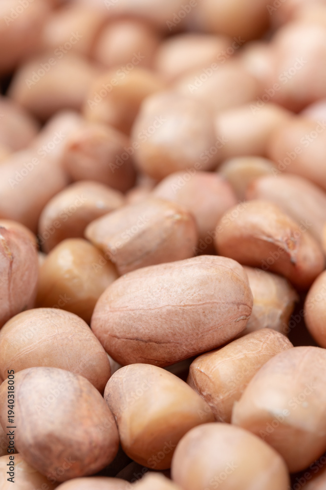 Obraz premium Pile of raw peanuts. Close-up