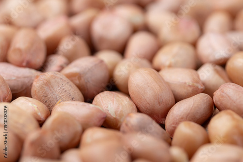 Pile of raw peanuts. Close-up