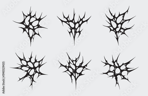 Abstract Neo Tribal Spiky Ornaments Vector Set, Cybersigilism Tattoo Design Elements for Streetwear and Edgy Branding, A collection of sharp red organic spiky shapes in neo tribal style on black.