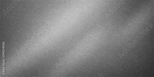 Dark gray brushed metal texture background with metallic steel surface and subtle light reflection pattern