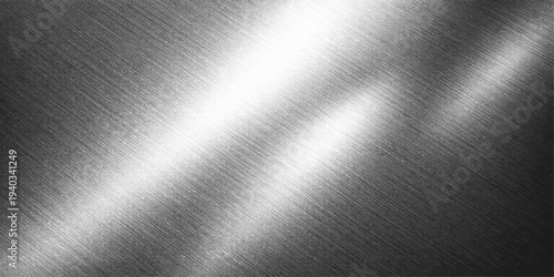 Brushed silver metal texture background with shiny stainless steel surface and industrial metallic pattern