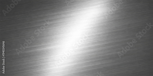 Brushed silver metal texture background with shiny stainless steel plate surface and smooth industrial metallic pattern