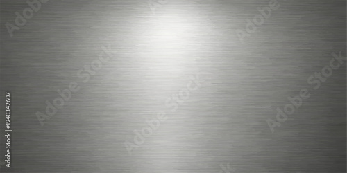 Brushed silver metal texture background with polished steel plate surface and shiny industrial metallic pattern