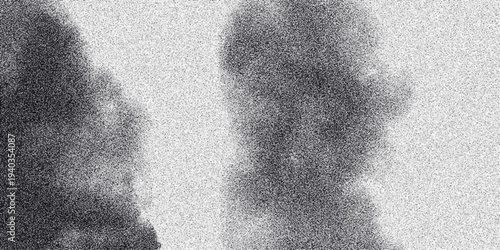 Abstract monochrome image with soft, blurred dark shapes and a fine grainy texture, creating a sense of depth and atmospheric mystery for abstract art and design backgrounds