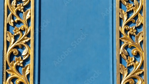 Golden ornate borders frame a solid blue panel