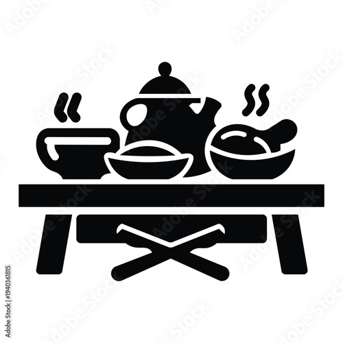 Dining table full of food icon