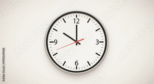 A simple wall clock showing ten o'clock on a clean white background.