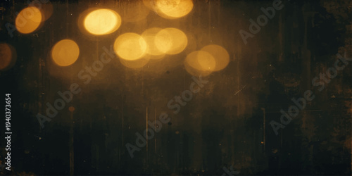 Rainy city night street view with colorful bokeh Christmas lights and blurred car traffic motion seen through raindrops on a window