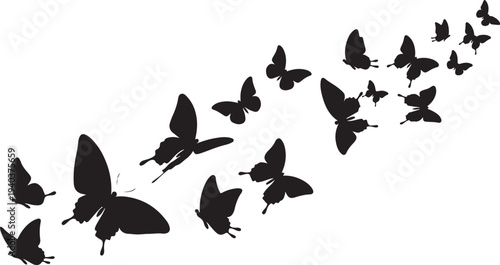 A flock of black butterflies flying in formation together