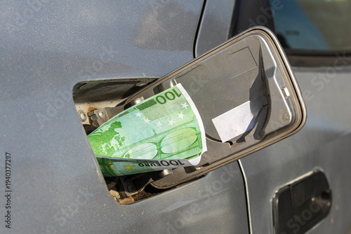 People pay for fuel amid rising gas prices and increased demand at gas stations in urban areas