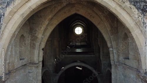 Cinematic aerial drone panorama of Coimbra, Portugal — historic European cityscape with skyline, landmarks and architecture in daylight, a high-angle travel view over urban rooftops