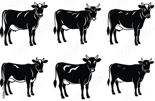 Three black cow silhouettes standing in grass isolated on white background