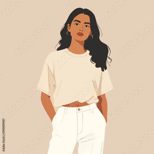 A young woman with long dark hair standing confidently in a minimalist outfit