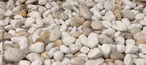 The white rock surface of the stone the background is rocky and full of rocks.
