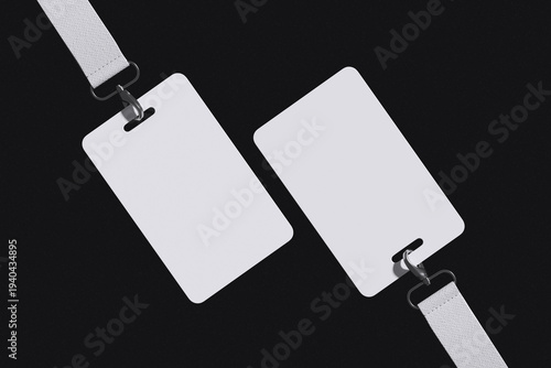 Fotografie Two floating white ID Card with lanyard on black background for mockup template