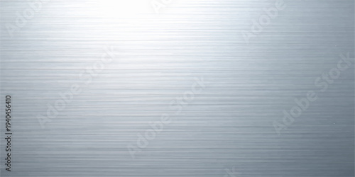 A shiny industrial backdrop featuring a textured silver stainless steel surface with a brushed metal plate pattern on a gray aluminum sheet material