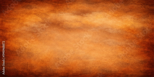 Vintage aged parchment paper with a stained grunge texture and a worn brown antique surface provides a blank retro background design for a weathered material backdrop