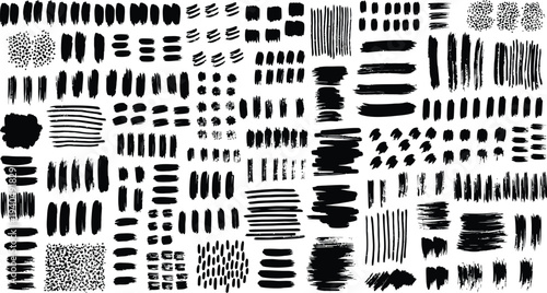 A collection of various black brush strokes and patterns on a white background