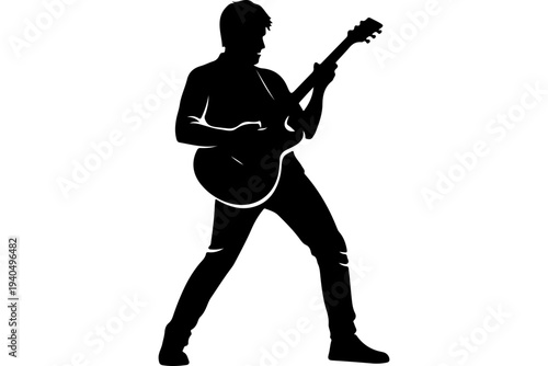 Silhouette of a Person Playing an Acoustic Guitar