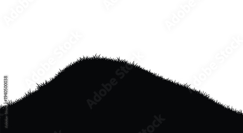 Rolling grassy hill against a stark white background silhouette