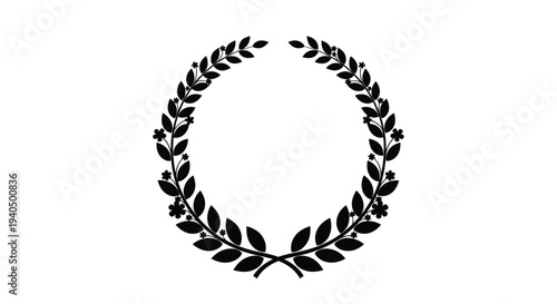 Circular wreath of leaves and flowers a striking black silhouette