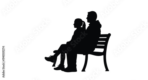 Couple sitting closely on a park bench a romantic silhouette