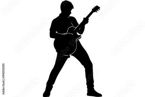 Silhouette of Guitarist Playing Acoustic Guitar