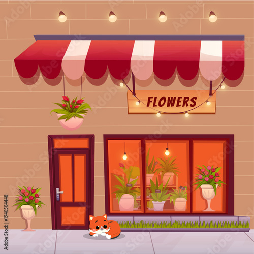 There is a kitten lying near the flower shop.
