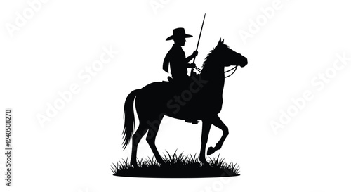 Cowboy riding a horse through grass a striking black silhouette